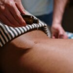 Experience tranquility with a soothing oil massage in a serene spa environment.